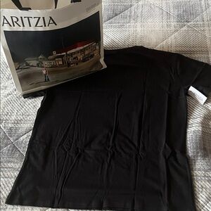Aritzia Black Short-Sleeve Crew with Small Gold Heart Emblem